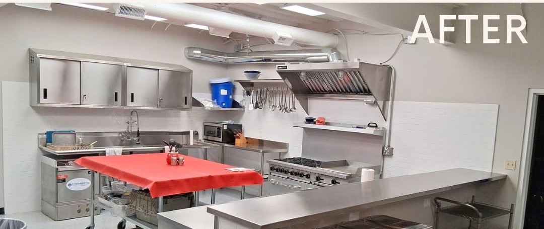 Commercial kitchen after renovation with stainless steel equipment